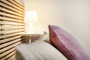 Posteľ alebo postele v izbe v ubytovaní Vincanto Rooms Old Town