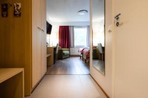 Postel nebo postele na pokoji v ubytování Lapland Hotels Sirkantähti