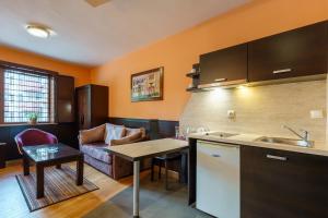 A kitchen or kitchenette at Hotel Ego - Free Parking - Top Central Location