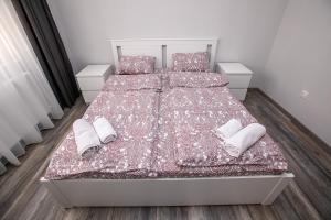 Кровать или кровати в номере Aparthouse Heaven