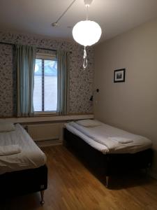 Postel nebo postele na pokoji v ubytování Uppsala Hostel by CityStay