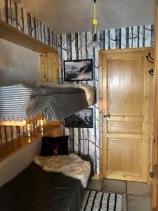 Våningssäng eller våningssängar i ett rum på Studio Le 4122 - Chamonix centre Clos du Savoy