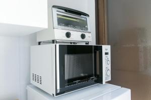 Kitchen o kitchenette sa trive kamejima 古民家 亀島駅徒歩1分 名古屋駅まで1駅