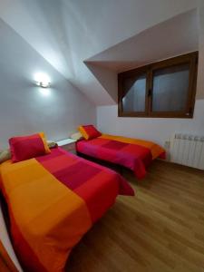 Katil atau katil-katil dalam bilik di Apartamento Monte Goriz