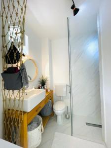 A bathroom at Chic sea front apartment with breathtaking Kotor Bay view