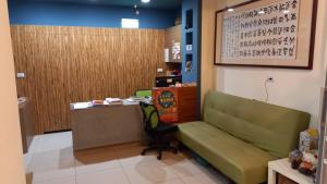 Istumisnurk majutusasutuses Plum Green Homestay