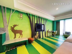 Televisyen dan/atau pusat hiburan di Chuang-tang Spring Spa Hotel
