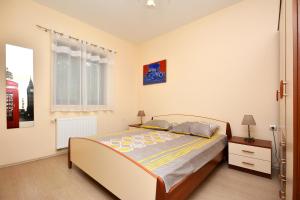 Postel nebo postele na pokoji v ubytování Villa Bisko with heated pool & jacuzzi + 46 fotografií