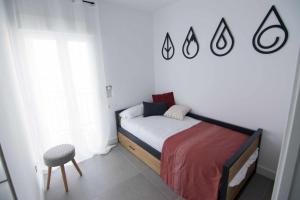 Ένα ή περισσότερα κρεβάτια σε δωμάτιο στο Casa con terraza y patio privado en Salobreña