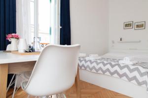 Postel nebo postele na pokoji v ubytování Milla Rooms