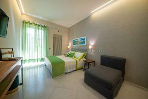 Postel nebo postele na pokoji v ubytování B&B La Piazzetta