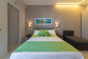 Postel nebo postele na pokoji v ubytování B&B La Piazzetta