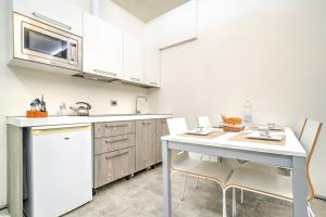 A kitchen or kitchenette at Al Pontile Venezia