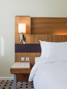 Voodi või voodid majutusasutuse Radisson Blu Airport Terminal Hotel toas