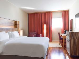 Voodi või voodid majutusasutuse Radisson Blu Airport Terminal Hotel toas