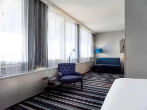 Voodi või voodid majutusasutuse Radisson Blu Airport Terminal Hotel toas
