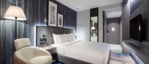 Postel nebo postele na pokoji v ubytování Radisson Hotel Izmir Aliaga