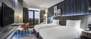 Postel nebo postele na pokoji v ubytování Radisson Hotel Izmir Aliaga