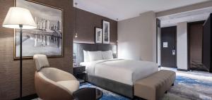 Postel nebo postele na pokoji v ubytování Radisson Hotel Izmir Aliaga