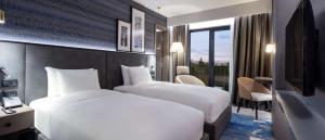 Postel nebo postele na pokoji v ubytování Radisson Hotel Izmir Aliaga