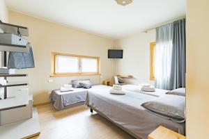 Cama o camas de una habitación en Guest House La Sosta