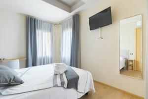 Posteľ alebo postele v izbe v ubytovaní Guest House La Sosta