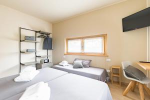 Posteľ alebo postele v izbe v ubytovaní Guest House La Sosta