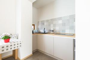 Kuchyňa alebo kuchynka v ubytovaní Guest House La Sosta