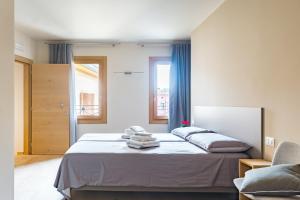 Posteľ alebo postele v izbe v ubytovaní Guest House La Sosta