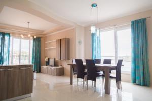 Area tempat duduk di Riviera Holiday Apartments - Seafront - Wifi