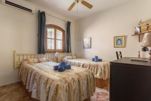 Posteľ alebo postele v izbe v ubytovaní Casa de Junemor + 17 fotografií
