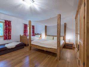 Posteľ alebo postele v izbe v ubytovaní Alpenresidenz Fieberbrunn