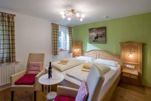 Posteľ alebo postele v izbe v ubytovaní Alpenresidenz Fieberbrunn