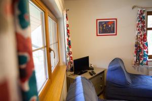 TV a/nebo společenská místnost v ubytování Penzion Krizky