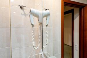 Koupelna v ubytování Hotel Rivulus