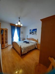 Postel nebo postele na pokoji v ubytování Cesa Bernard