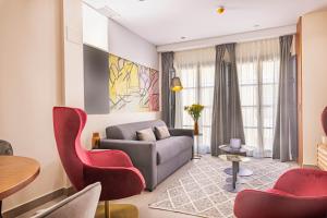 Home Art Apartments Soho的休息区