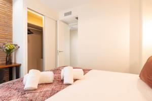 Home Art Apartments Soho客房内的一张或多张床位