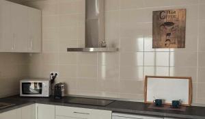 Kuchnia lub aneks kuchenny w obiekcie San José Apartamentos Turísticos Karlie