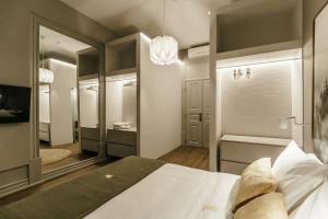 Uma cama ou camas num quarto em Royal Collection Covilh