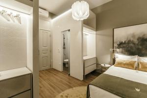Uma cama ou camas num quarto em Royal Collection Covilh