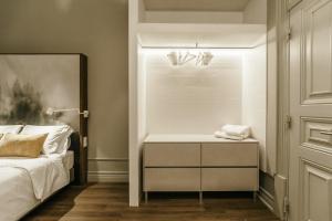 Uma cama ou camas num quarto em Royal Collection Covilh