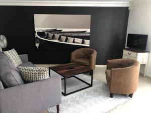 Χώρος καθιστικού στο Villa Watsonia