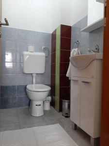 Koupelna v ubytování Aleksandar apartmani