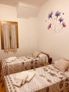 Un pat sau paturi într-o cameră la Casa Dei Nonni