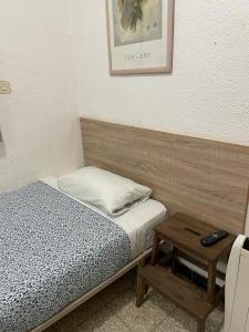 Postel nebo postele na pokoji v ubytování Pensión Fortea