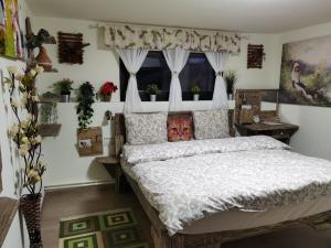 Giường trong phòng chung tại Romanita Holiday Club