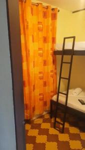 Voodi või voodid majutusasutuse Hostel Dodero toas