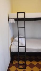 Voodi või voodid majutusasutuse Hostel Dodero toas