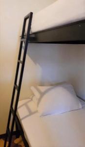 Voodi või voodid majutusasutuse Hostel Dodero toas